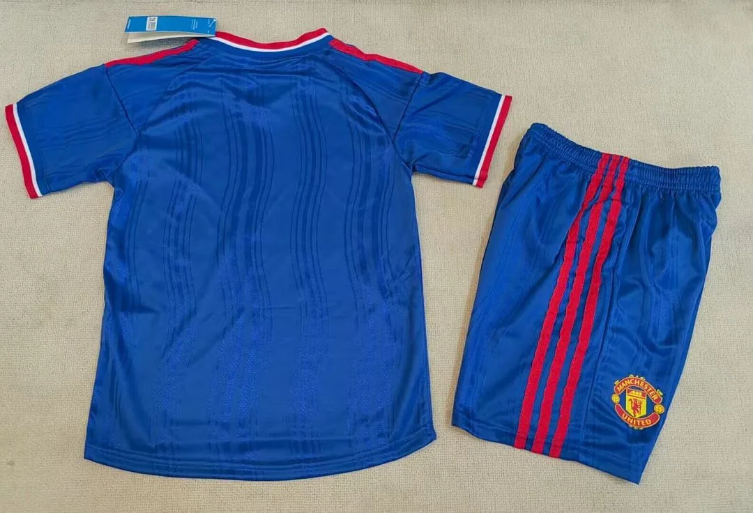 Manchester United 2026/27 Segunda Equipación Conjunto de Niño Versión Jugador Blue — 1